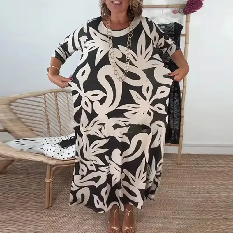 Vestido Mídi Longo Nerina™ com Estampa Floral Abstrata / A Elegância Solta que Inspira Liberdade!