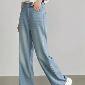 Calça Jeans Meghan™ com Modelagem Relax Premium / A Mais Soltinha, Leve e Versátil que Você Vai Vestir!