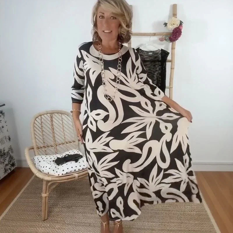 Vestido Mídi Longo Nerina™ com Estampa Floral Abstrata / A Elegância Solta que Inspira Liberdade!